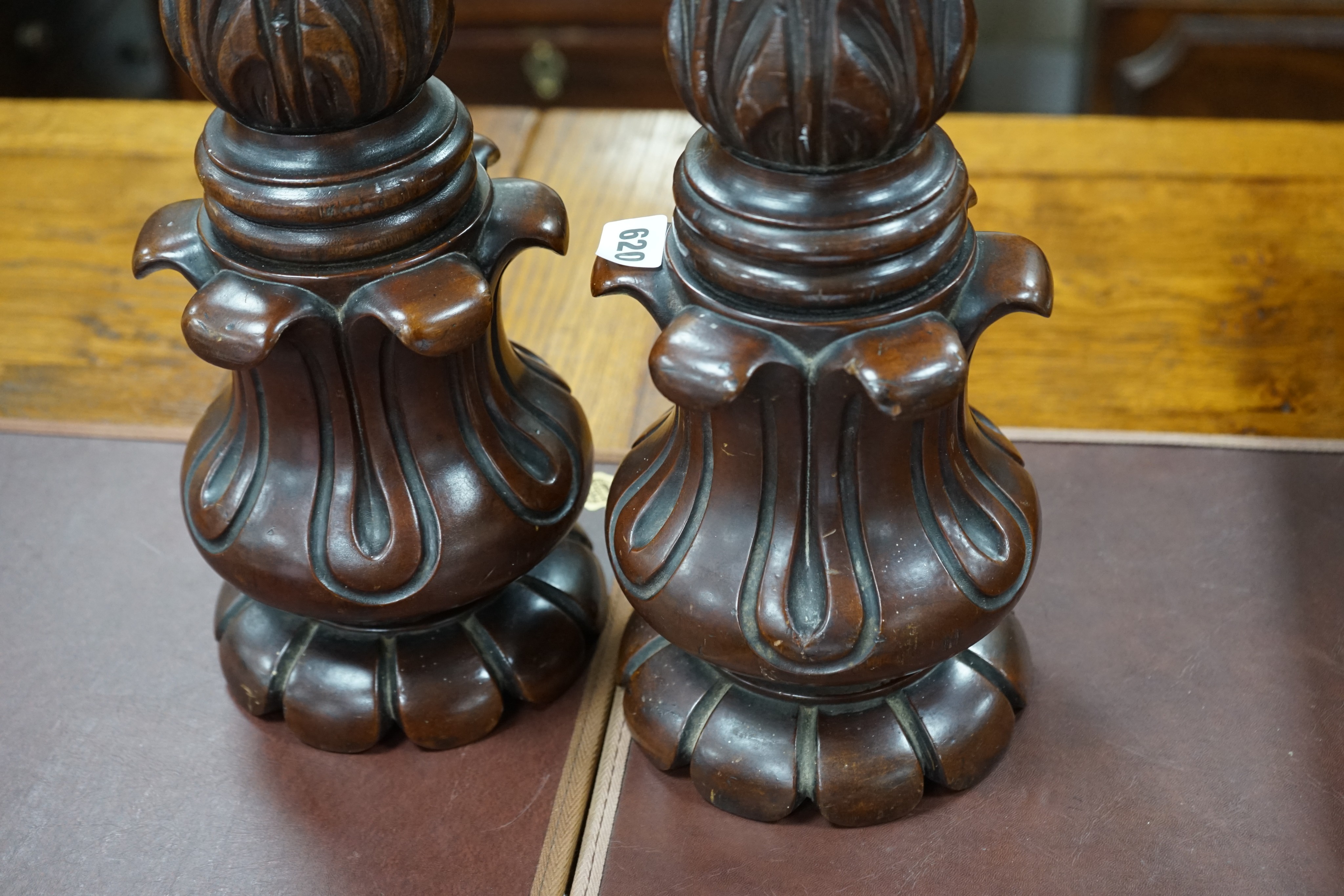 A pair of William mahogany 'bedpost' candlestands